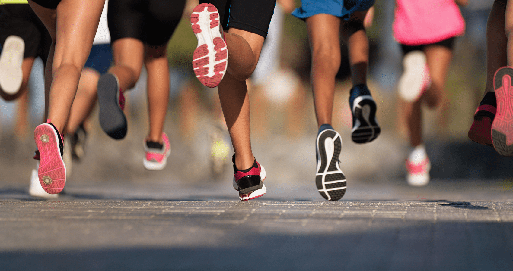 Feet running in a sunny day