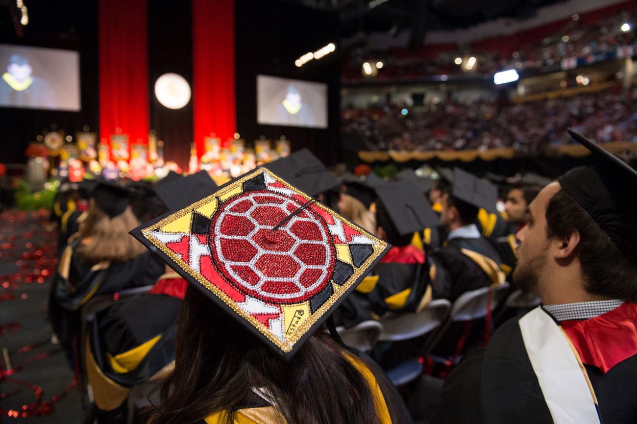 Students at UMD Commencement Ceremony wearing caps and gowns