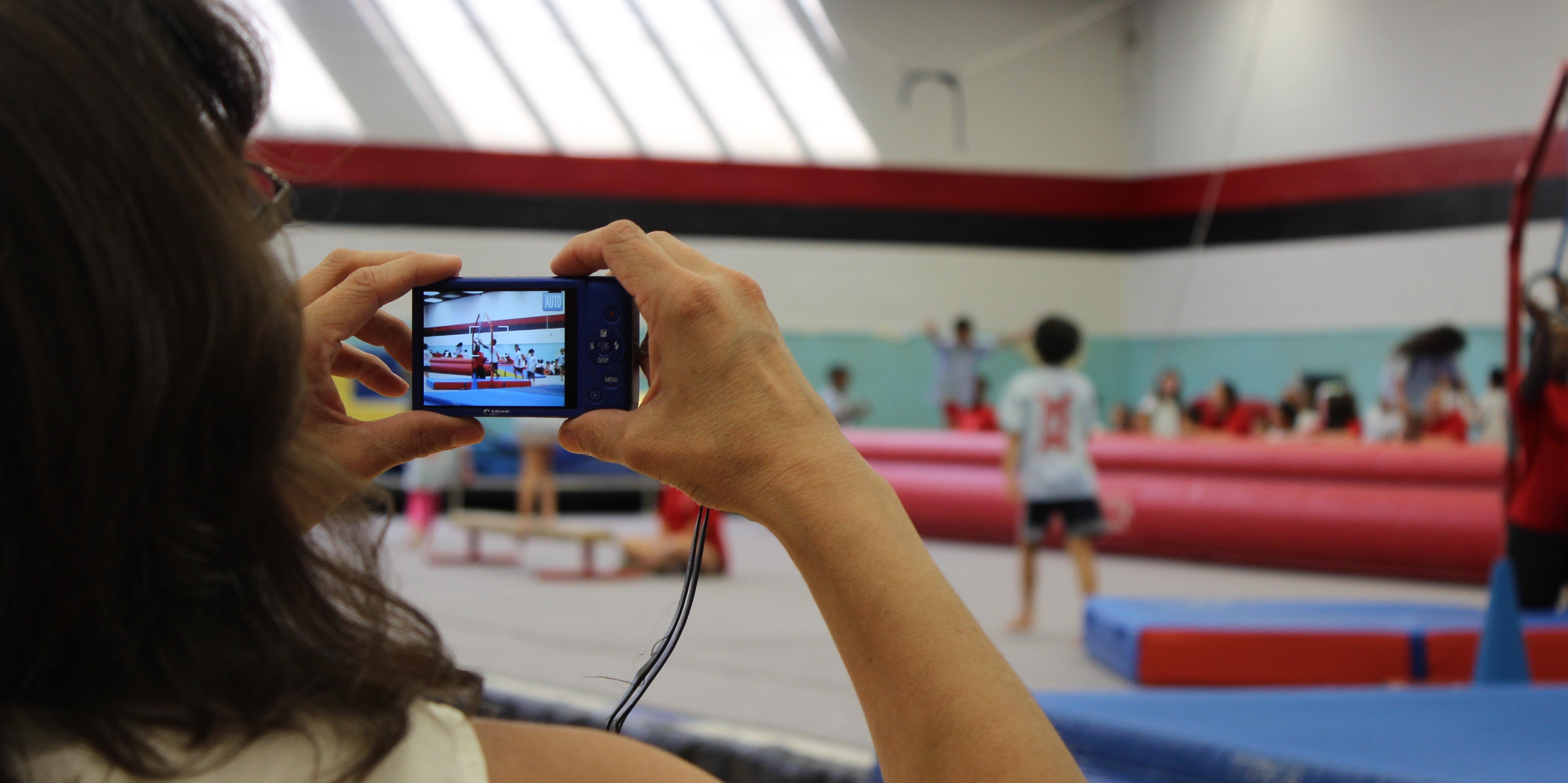 Mom taking a picture of her child attending UMD Gymkana Summer Camp